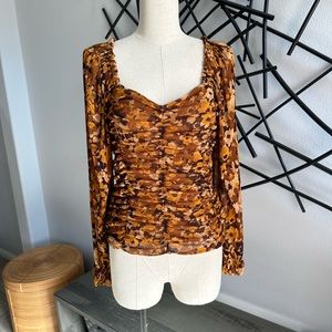 Shirred, long sleeve, square-neck top.